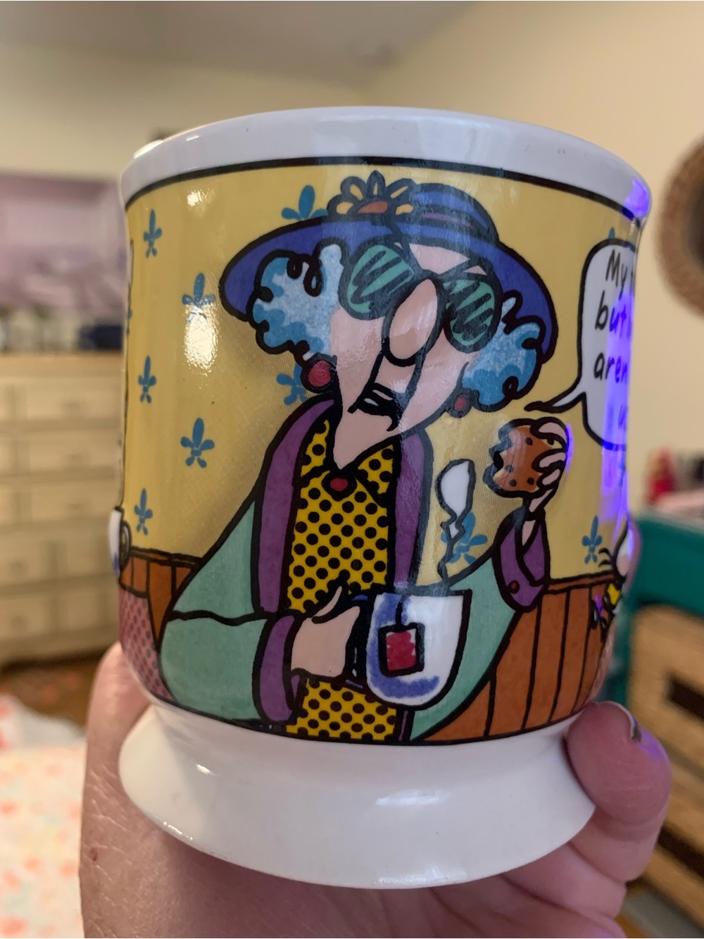 Hallmark’s Maxine White Ceramic Mug features a 3-D raised graphic of Maxine